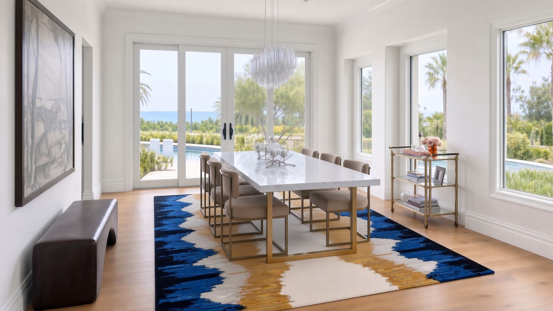 Elegant Newport Beach dining room with a blue and gold rug, designed by Ariane Bibas